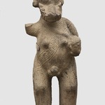 Human Figure Wearing Crocodile Mask