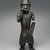 Edo. <em>Figure of a Hornblower (Ikpakohẹn)</em>, ca. 1504–50. Copper alloy, iron, 24 1/2 x 8 1/2 x 6 in. (62.2 x 21.6 x 15.2 cm). Brooklyn Museum, Gift of Mr. and Mrs. Alastair B. Martin, the Guennol Collection, 55.87. Creative Commons-BY (Photo: Brooklyn Museum, 55.87_front_SL1.jpg)