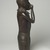 Edo. <em>Figure of a Hornblower (Ikpakohẹn)</em>, ca. 1504–50. Copper alloy, iron, 24 1/2 x 8 1/2 x 6 in. (62.2 x 21.6 x 15.2 cm). Brooklyn Museum, Gift of Mr. and Mrs. Alastair B. Martin, the Guennol Collection, 55.87. Creative Commons-BY (Photo: Brooklyn Museum, 55.87_right_PS11.jpg)