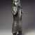 Edo. <em>Figure of a Hornblower (Ikpakohẹn)</em>, ca. 1504–50. Copper alloy, iron, 24 1/2 x 8 1/2 x 6 in. (62.2 x 21.6 x 15.2 cm). Brooklyn Museum, Gift of Mr. and Mrs. Alastair B. Martin, the Guennol Collection, 55.87. Creative Commons-BY (Photo: Brooklyn Museum, 55.87_view2_SL4.jpg)